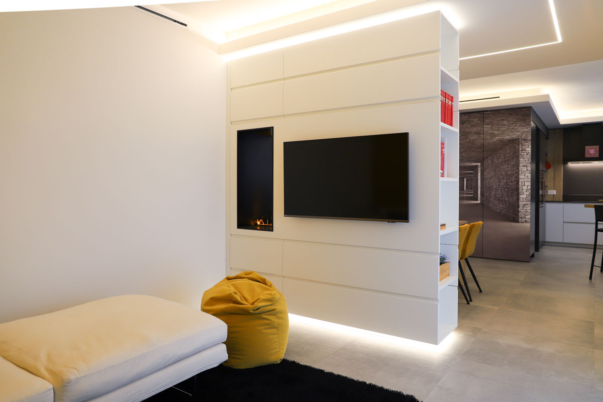 https://www.gruppo5.it/wp-content/uploads/2025/12/progetto-casa-moderna-zona-living-parete-divisoria-tv-4.jpg
